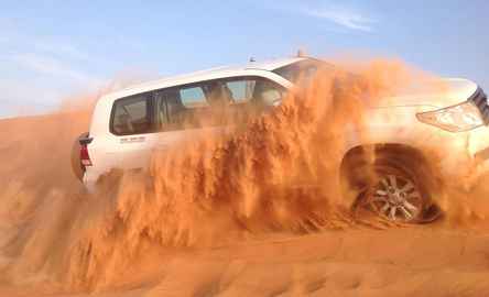 Arabian Desert Dunes Safari with Camel Ride and Dinner