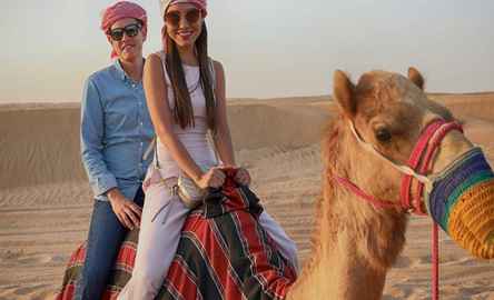 Morning Desert Safari, Sandboarding and Camel Ride